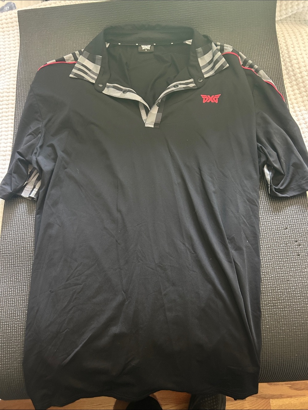 PXG Black Polo with Gray Stripe Collar and Red Logo